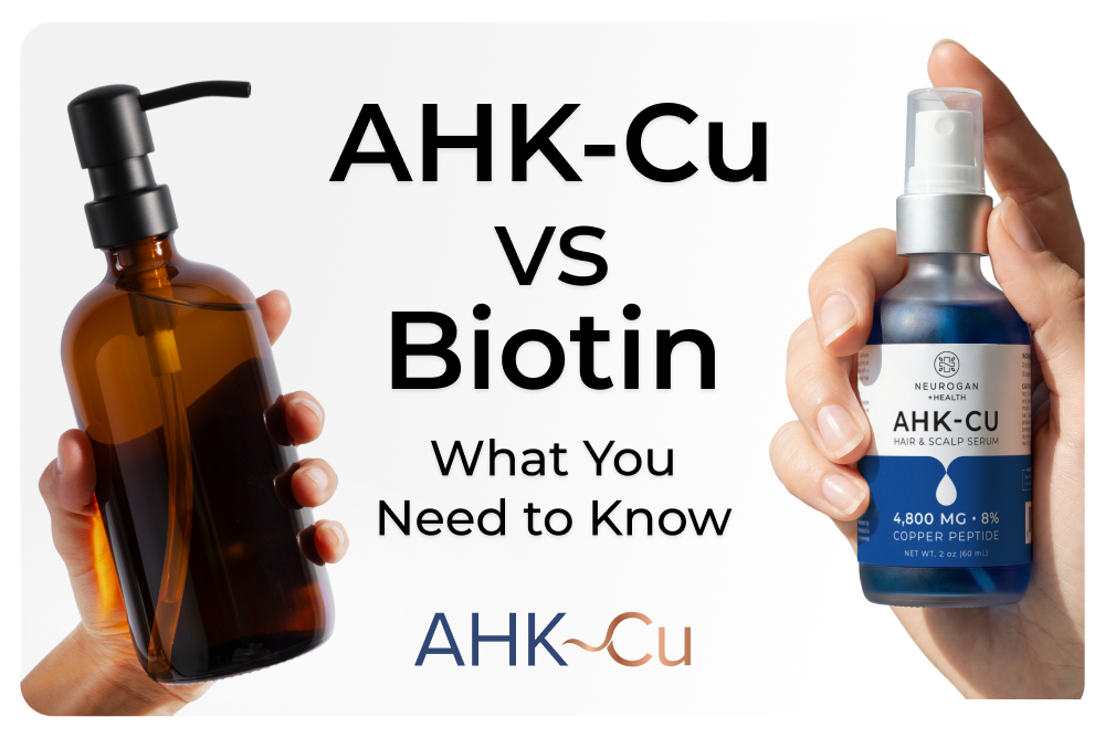 Graphic titled “AHK-Cu vs Biotin: What You Need to Know” showing two hands holding different hair-care product bottles for comparison, including an AHK-CU hair and scalp serum bottle, with the AHK~Cu logo at the bottom.